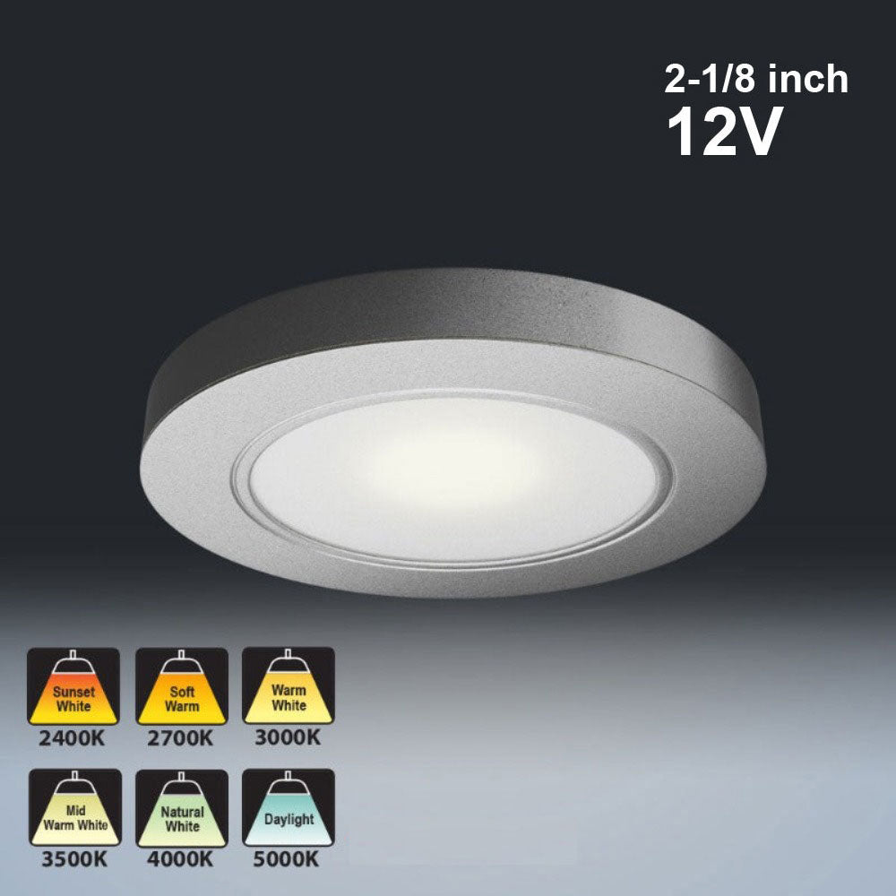 Silver grey round LED under cabinet light, 2-1/8 inch, 12V with multiple color temperature options (2400K to 5000K).