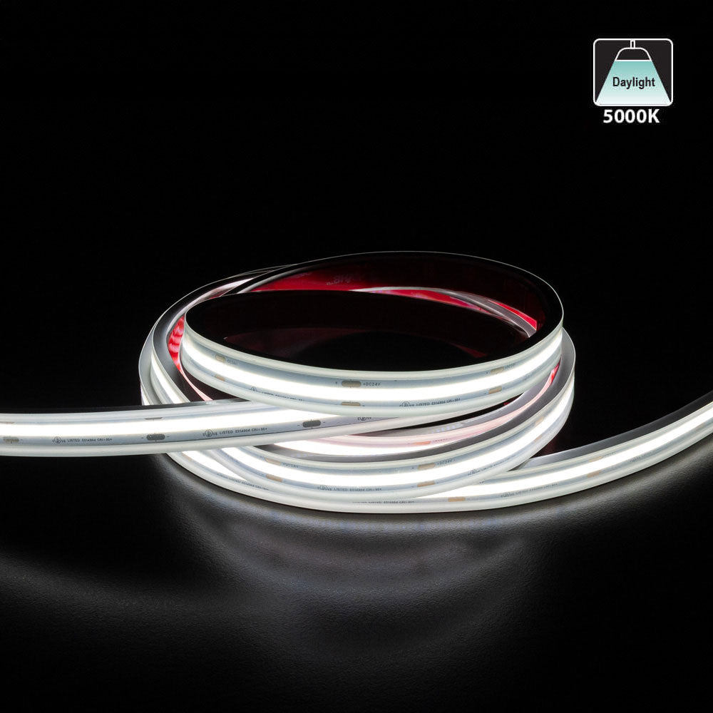 Custom cut outdoor COB LED strip light showcasing flexible daylight 5000K illumination on a black surface.