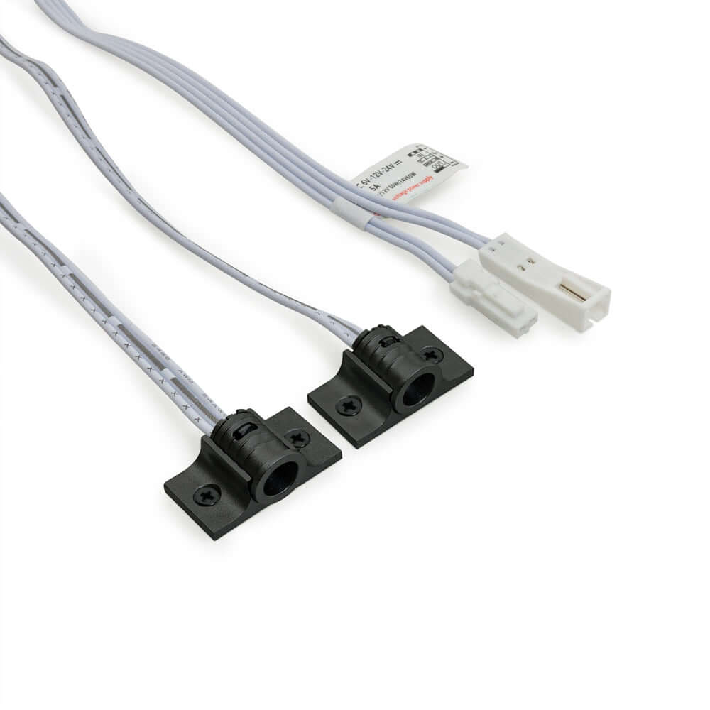 Double head door sensor switch wiring with black connectors and white cables for 12-24V system.