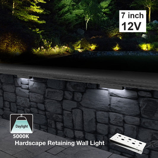 7 inch outdoor landscape retaining wall light, 12V, 2W, daylight 5000K, illuminating stone wall in backyard.