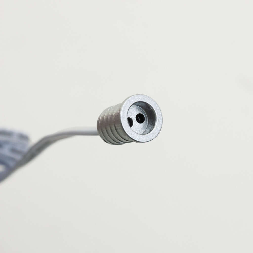 Close-up of the 5029M-S door sensor switch connector with a silver gray finish.